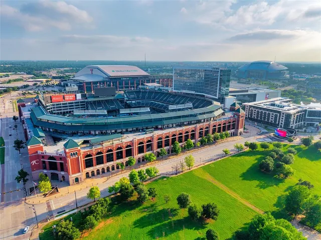 an aerial view of a balcony with yard