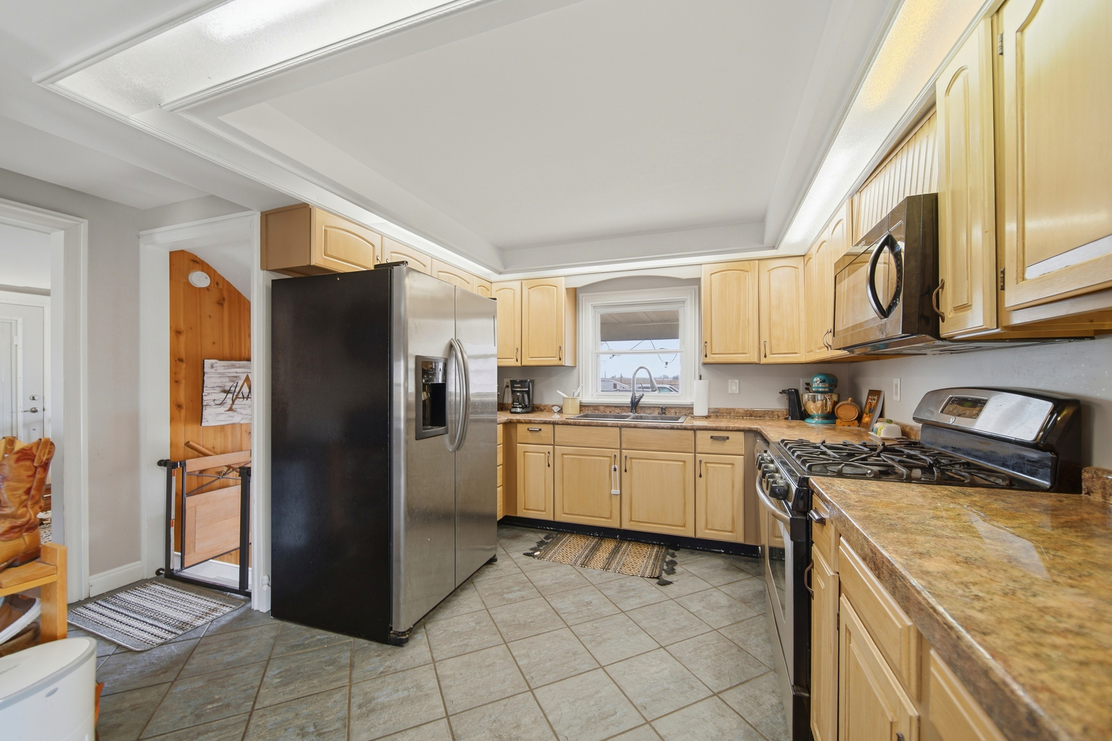 27754 Elm Road Milledgeville, IL 61051 - Photo 12 of 28 a kitchen with a refrigerator sink and cabinets