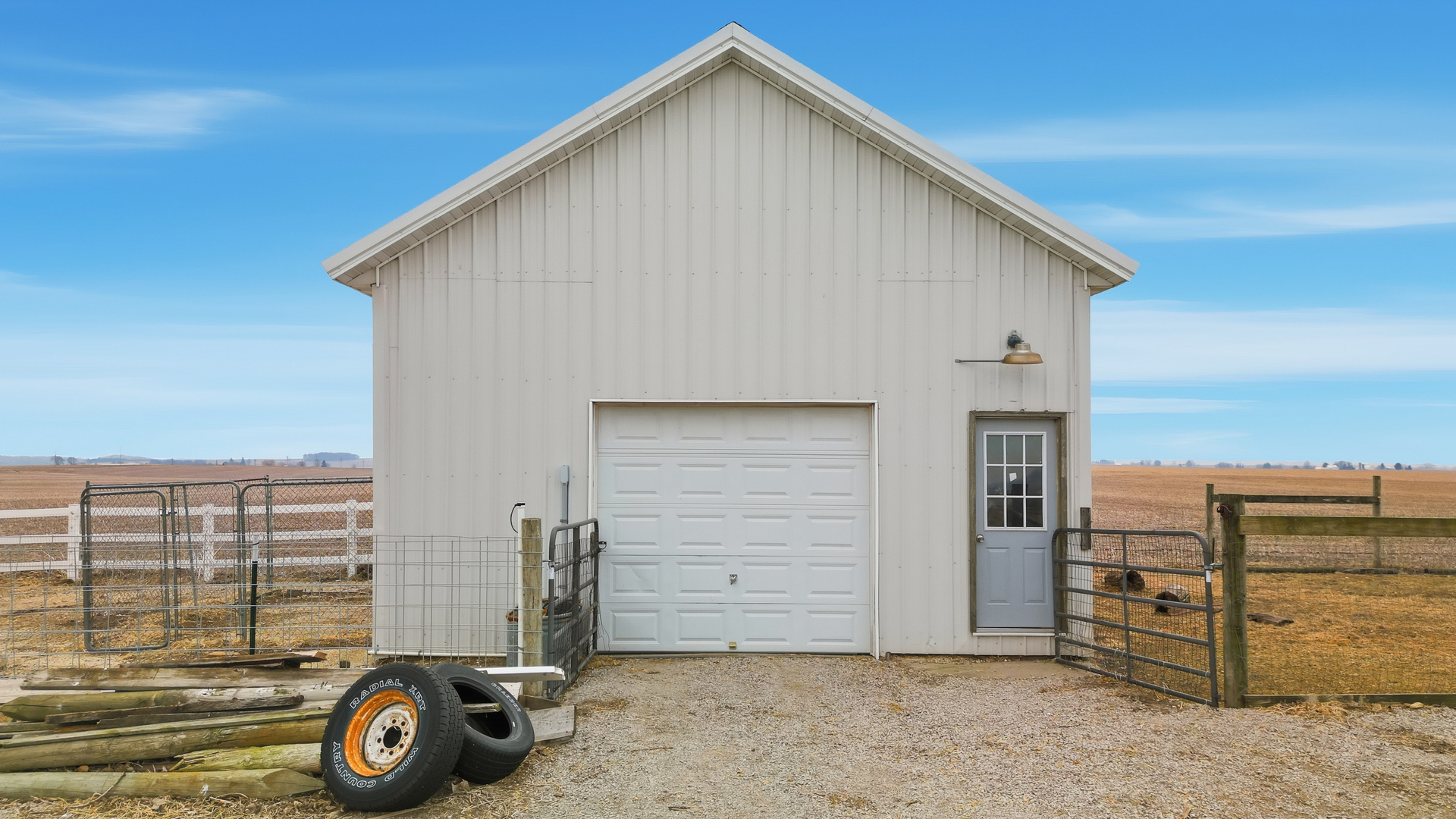 27754 Elm Road Milledgeville, IL 61051 - Photo 10 of 28 a view of a house with a garage