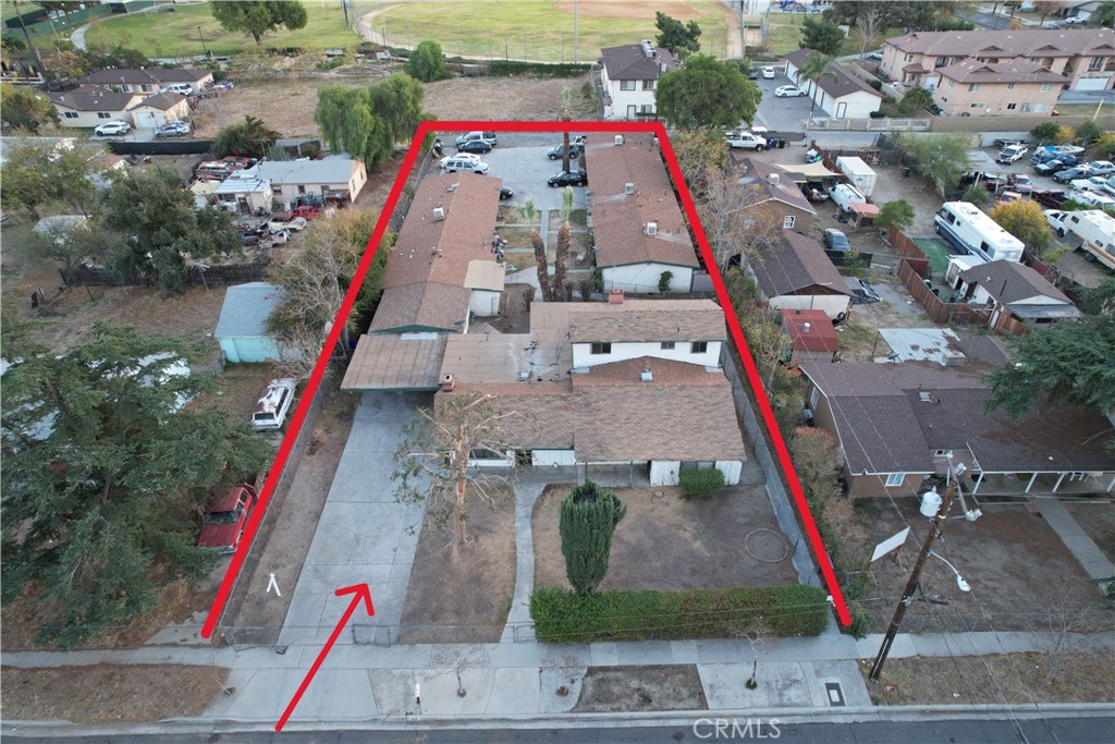 427 West 3rd Street Rialto, CA 92376 - Photo 1 of 1 an aerial view of a house with a park