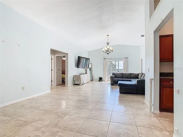 a view of a chandelier and entryway