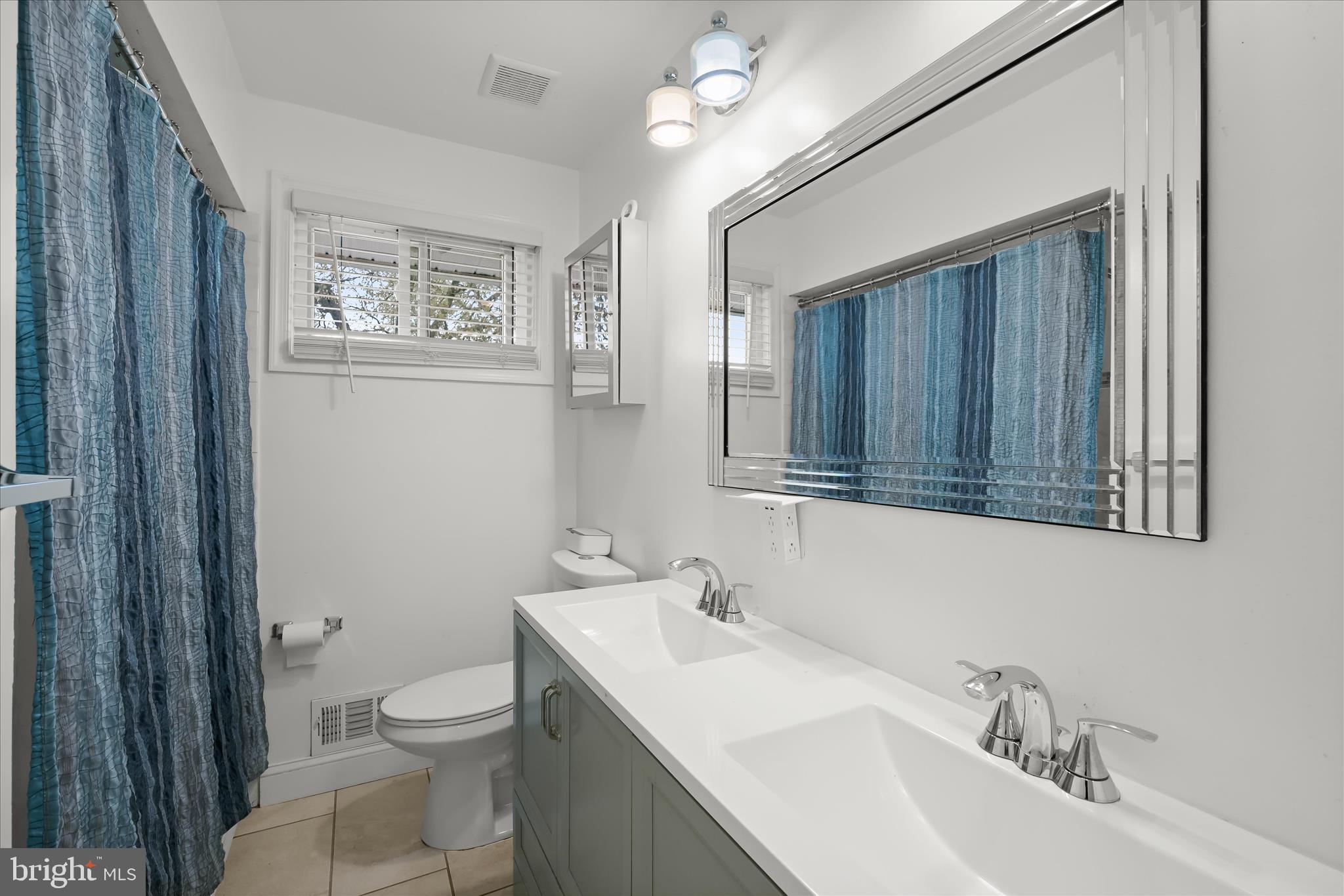 9713 Tulsemere Road Randallstown, MD 21133 - Photo 27 of 44 Hall bathroom