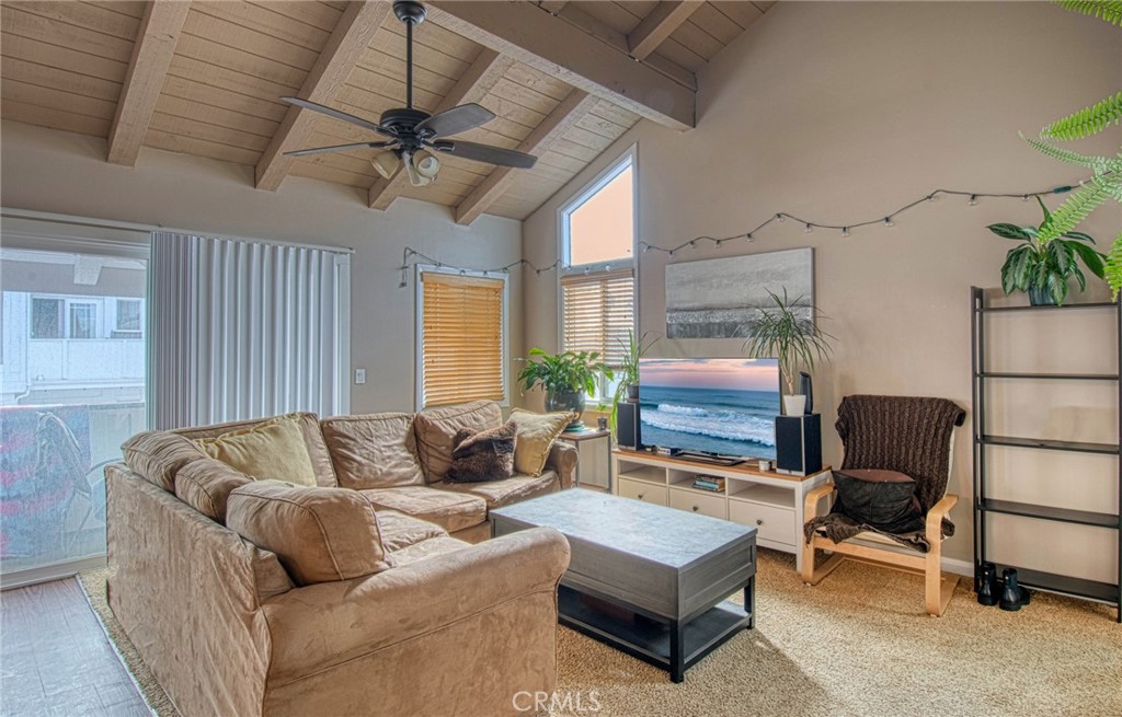 209 Walnut Street Newport Beach, CA 92663 - Photo 16 of 30 a living room with furniture and a large window