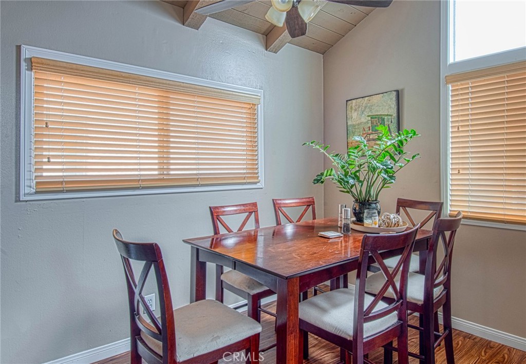 209 Walnut Street Newport Beach, CA 92663 - Photo 21 of 30 a dining room with furniture and window