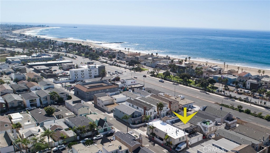 209 Walnut Street Newport Beach, CA 92663 - Photo 29 of 30 an aerial view of a city with lots of residential buildings and ocean view in back