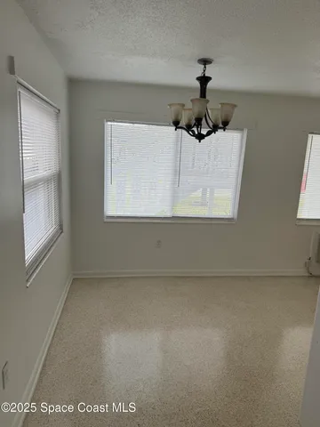 a picture of a room with a window