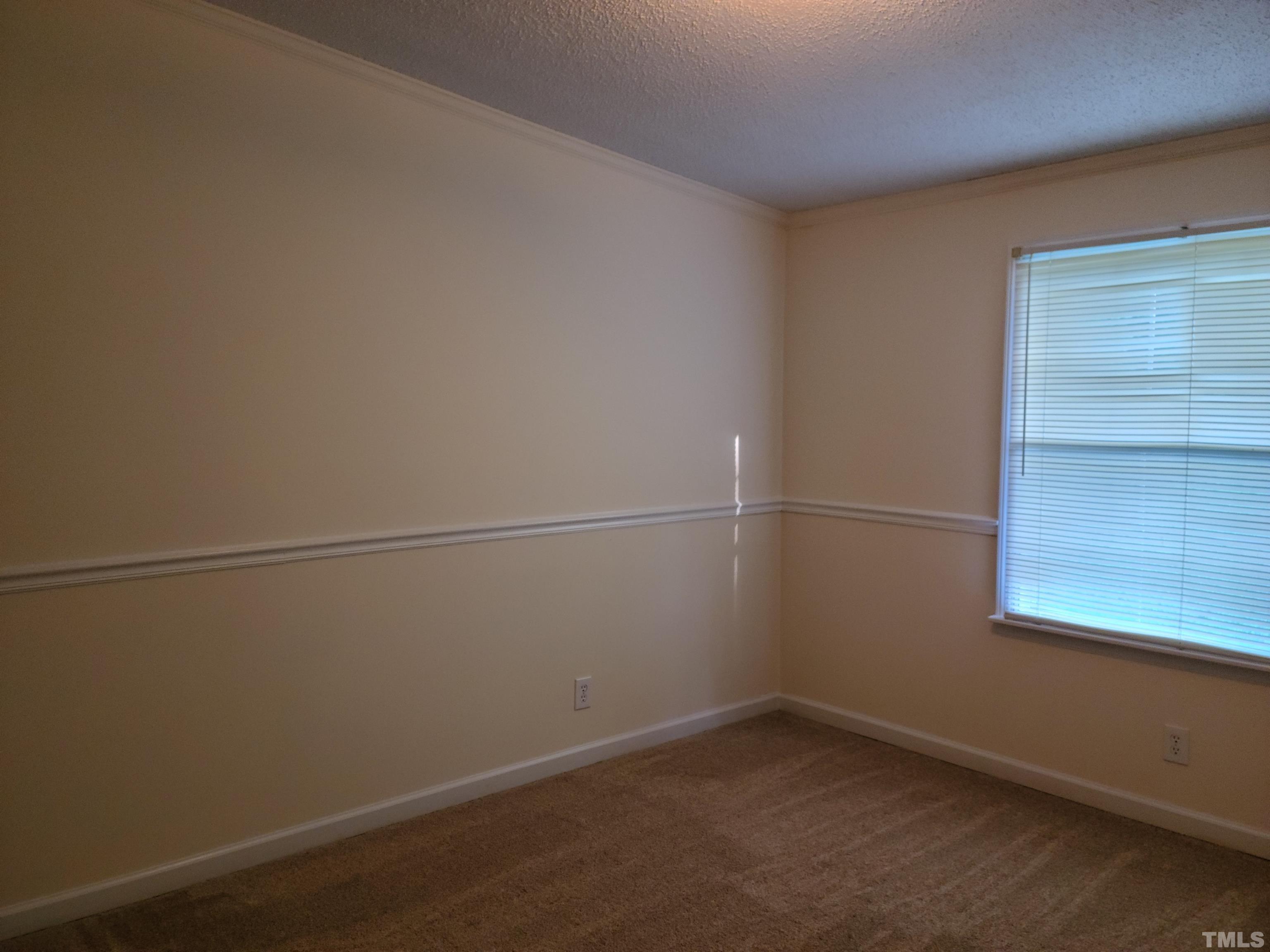2911 Red Mountain Road Rougemont, NC 27572 - Photo 8 of 64 an empty room with a window