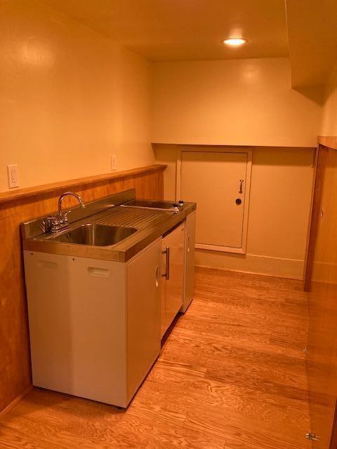 ** Cheltenham Road Santa Barbara, CA 93105 - Photo 7 of 9 a kitchen with stainless steel appliances granite countertop a sink and cabinets