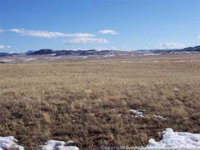 9868 Jackson Road Hartsel, CO 80449 - Photo 1 of 1 a view of lake and mountain