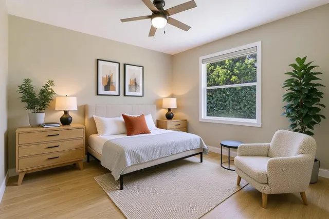 a bedroom with a bed and a couch