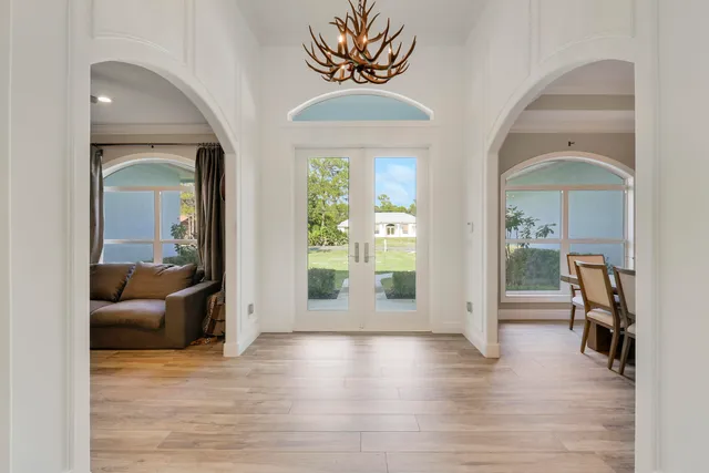 a view of a livingroom with furniture and front door