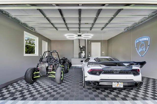 a living room with furniture a rug and gym equipment