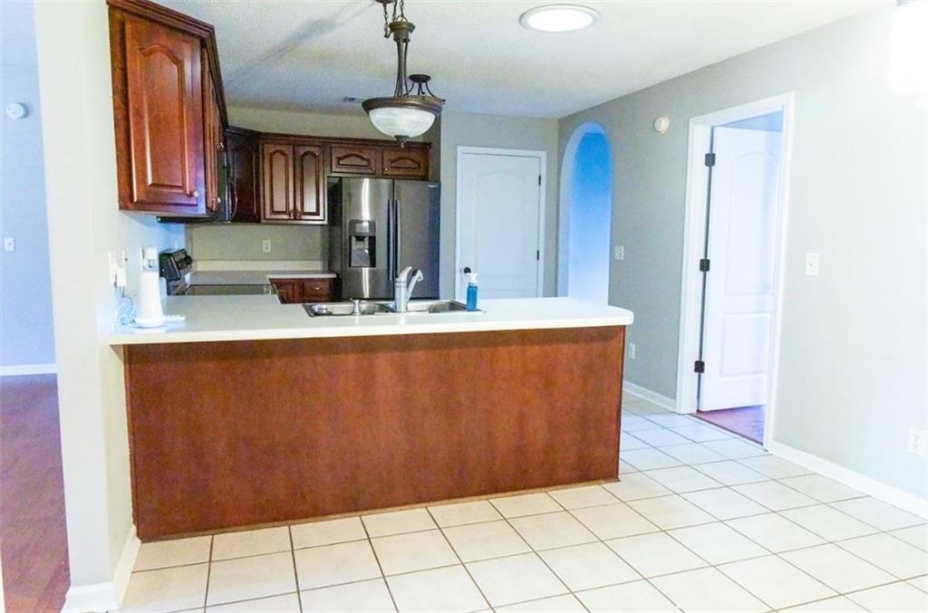 28 Papershell Drive Fort Valley, GA 31030 - Photo 13 of 64 a room with granite countertop a sink cabinets and window
