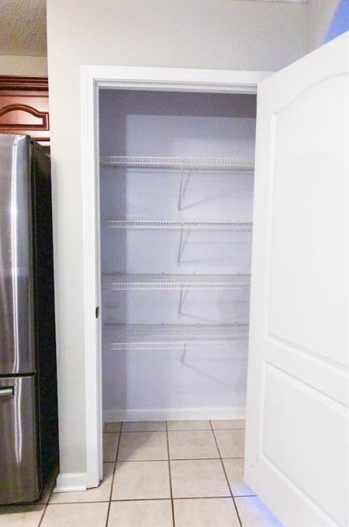 28 Papershell Drive Fort Valley, GA 31030 - Photo 17 of 64 a view of walk in closet with empty racks