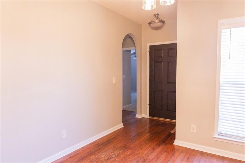 28 Papershell Drive Fort Valley, GA 31030 - Photo 23 of 64 a view of a livingroom with wooden floor and a window