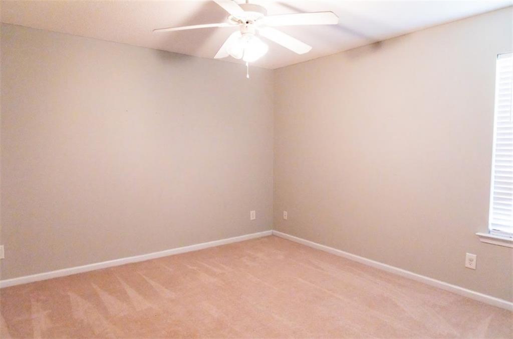 28 Papershell Drive Fort Valley, GA 31030 - Photo 38 of 64 an empty room with a window and a fan