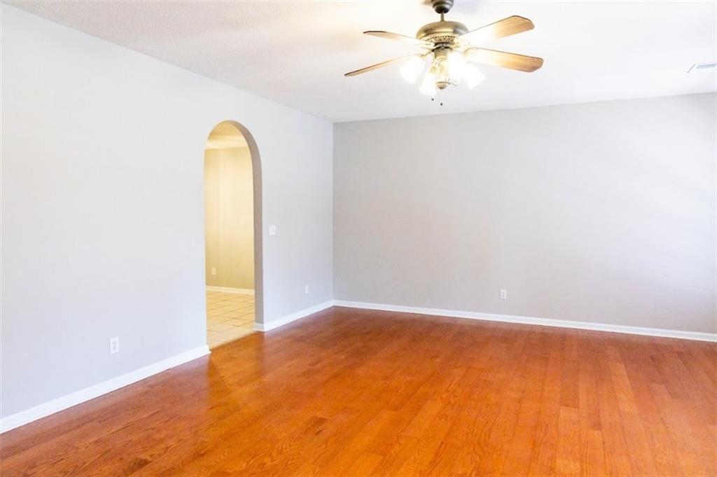 28 Papershell Drive Fort Valley, GA 31030 - Photo 43 of 64 a view of a room with wooden floor and a chandelier fan