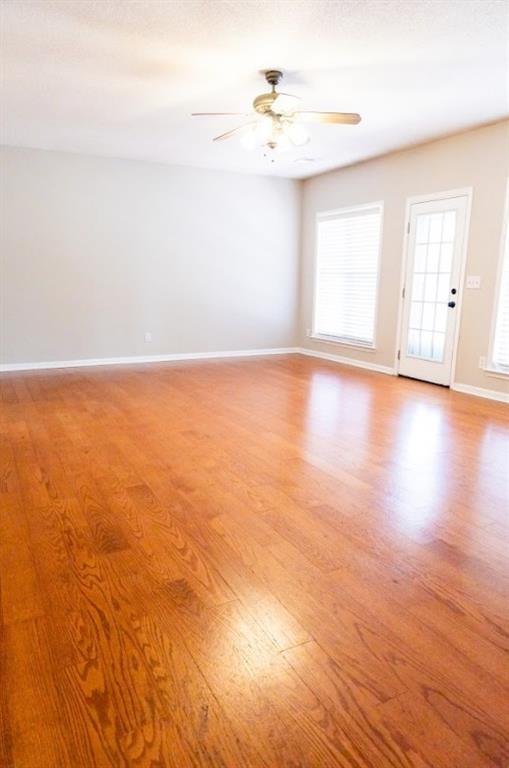 28 Papershell Drive Fort Valley, GA 31030 - Photo 45 of 64 an empty room with wooden floor and windows