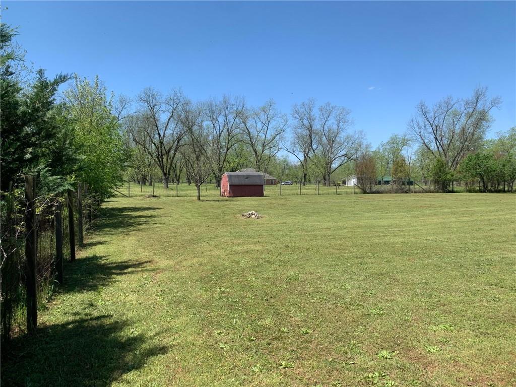 28 Papershell Drive Fort Valley, GA 31030 - Photo 62 of 64 a grassy field with trees in the background