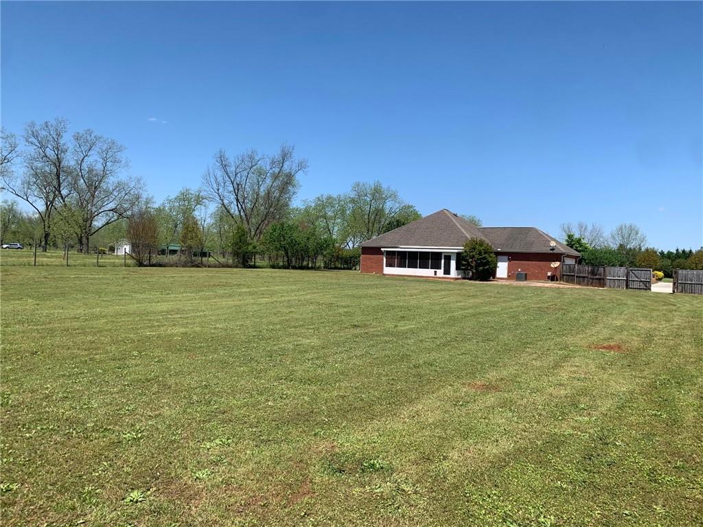 28 Papershell Drive Fort Valley, GA 31030 - Photo 64 of 64 a view of a green field with house in the background
