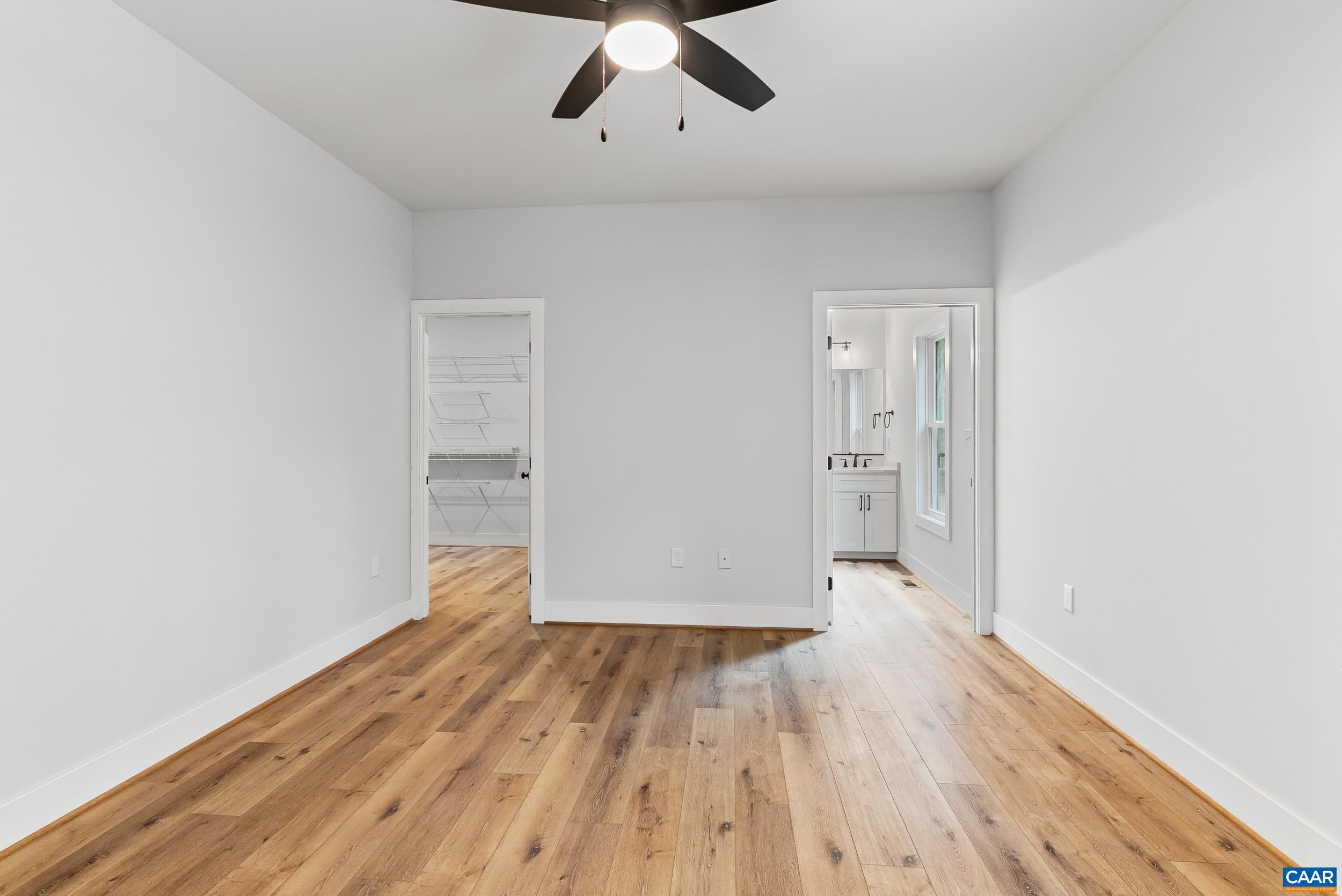 594 Community Road Dillwyn, VA 23936 - Photo 31 of 48 wooden floor in an empty room with a window