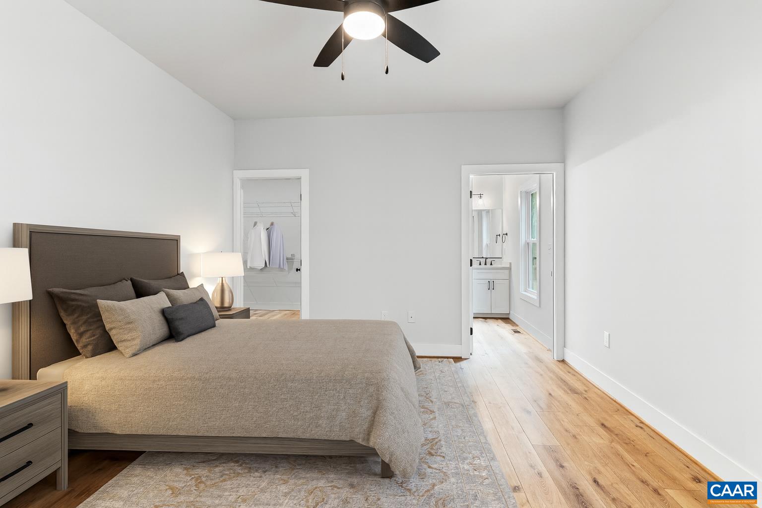 594 Community Road Dillwyn, VA 23936 - Photo 10 of 48 a bedroom with a bed and painting on the wall