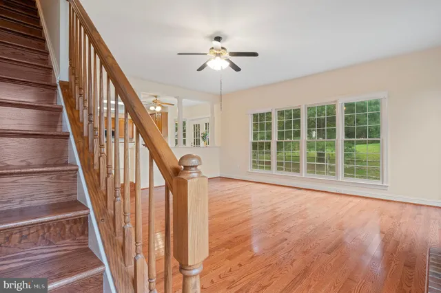 a bathroom with a shower and a window