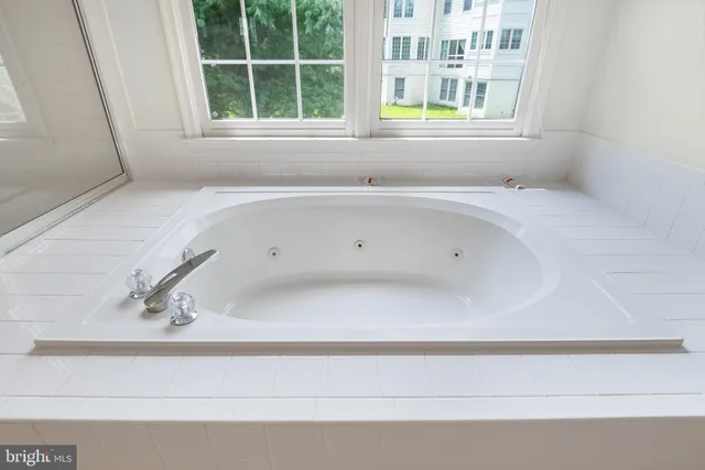 a view of an empty room and entryway