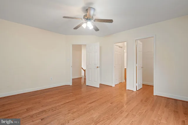 an aerial view of a house with yard swimming pool and outdoor seating