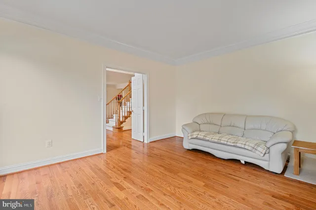 a view of an entryway with wooden floor