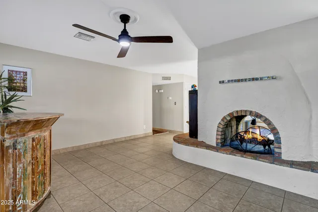 a view of a livingroom with a car parked in it