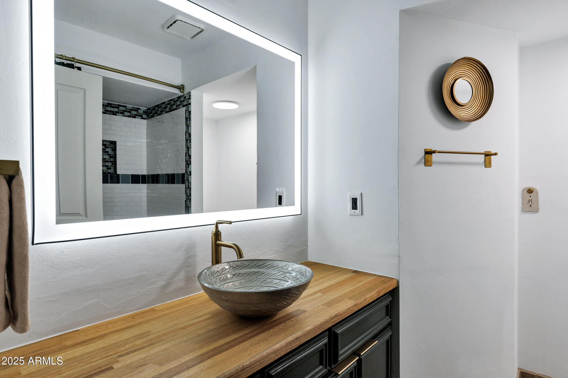 1291 South Red Rock Court Apache Junction, AZ 85119 - Photo 31 of 48 a bathroom with a granite countertop sink and a mirror