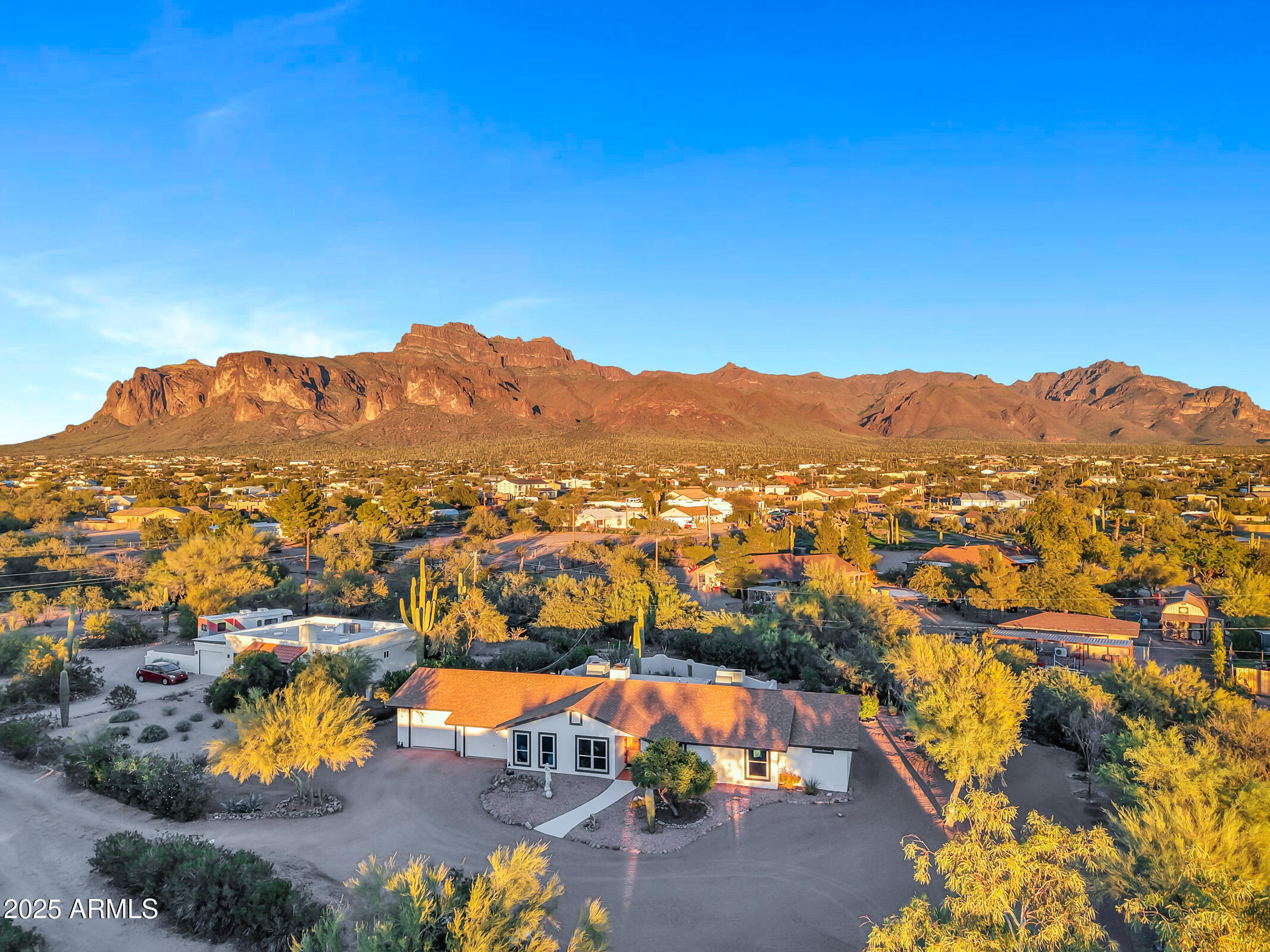 1291 South Red Rock Court Apache Junction, AZ 85119 - Photo 45 of 48 an aerial view of residential houses with outdoor space