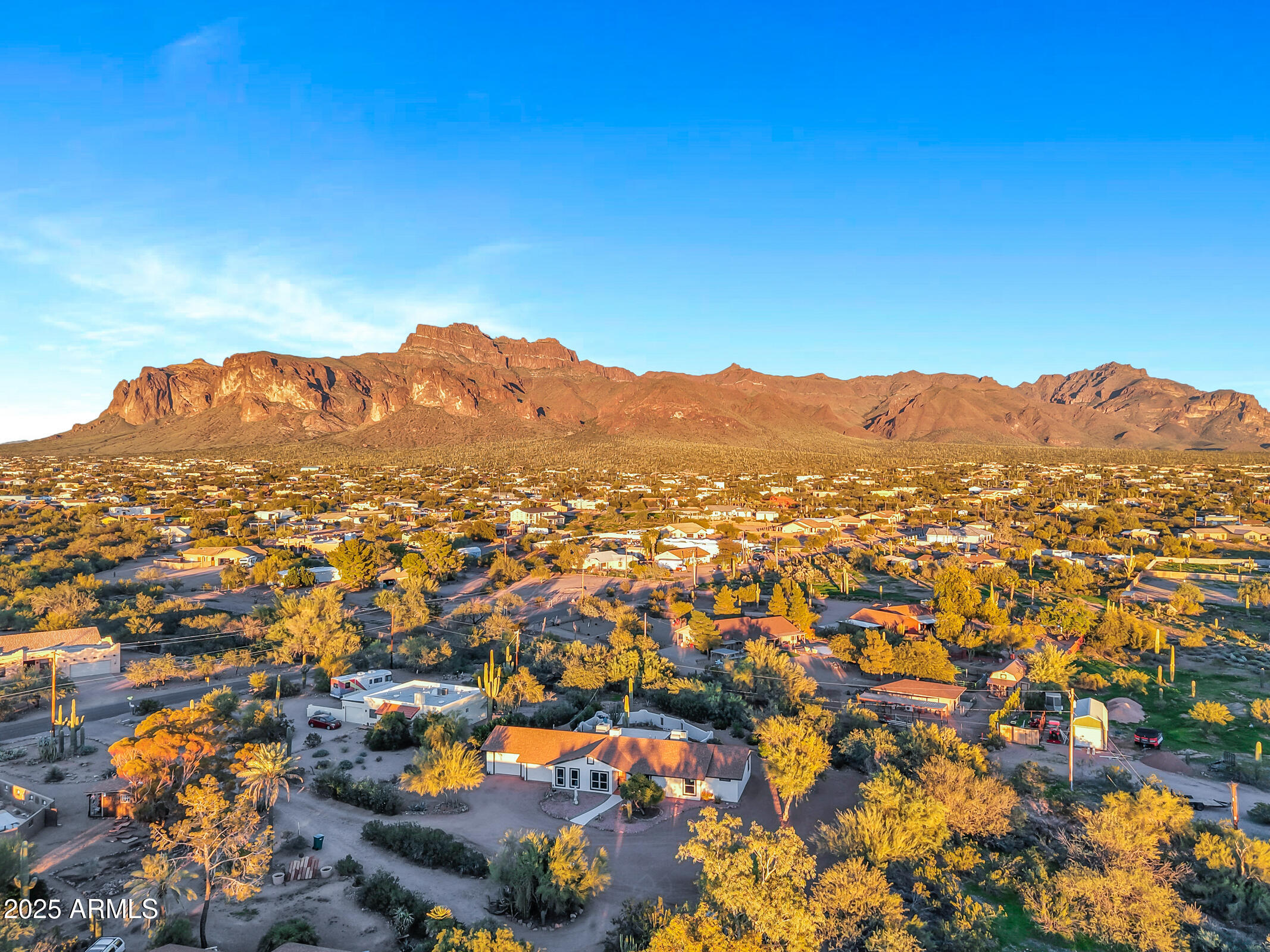 1291 South Red Rock Court Apache Junction, AZ 85119 - Photo 46 of 48 an aerial view of residential houses with outdoor space and trees