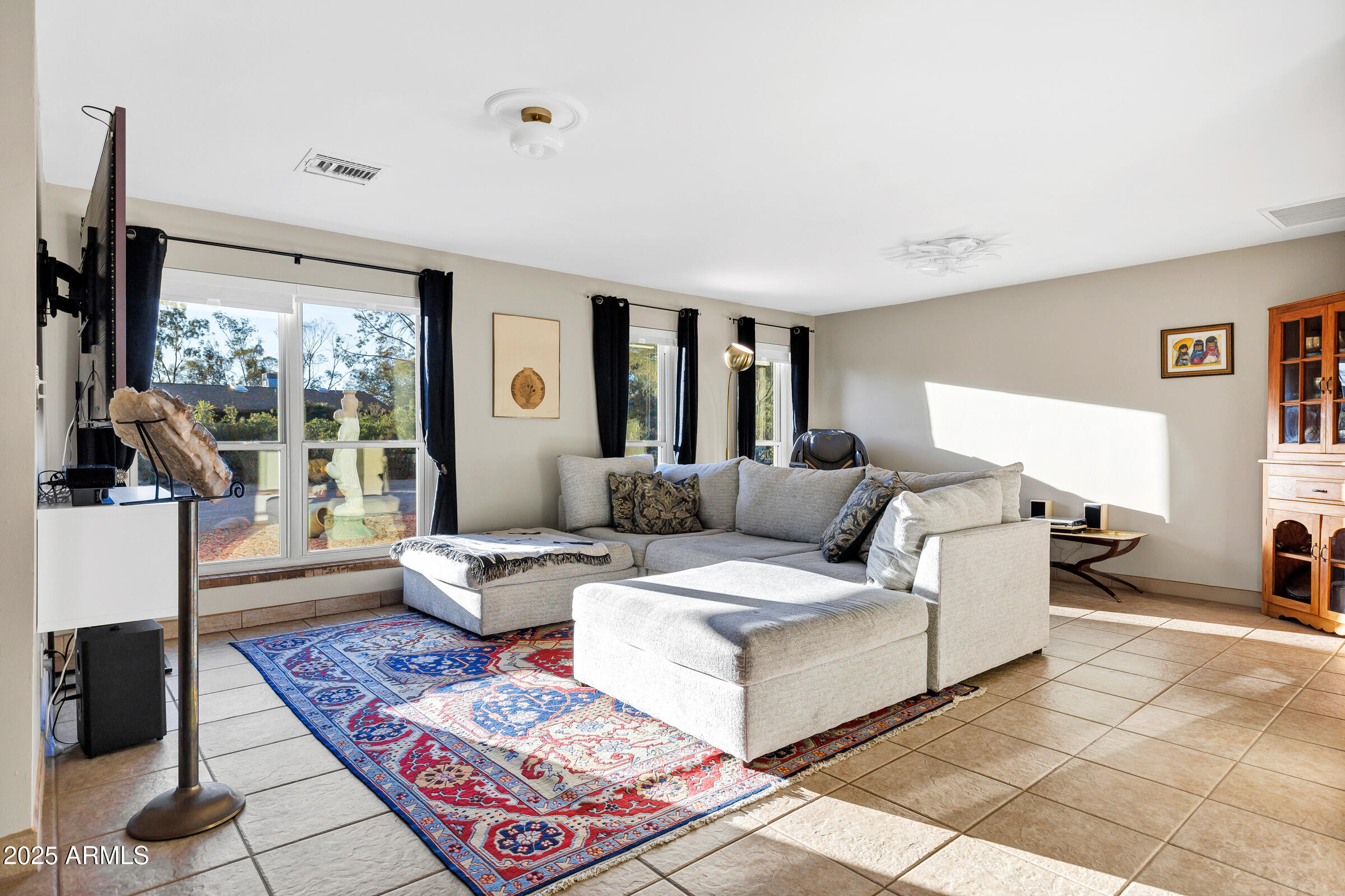 1291 South Red Rock Court Apache Junction, AZ 85119 - Photo 8 of 48 a living room with furniture and a rug