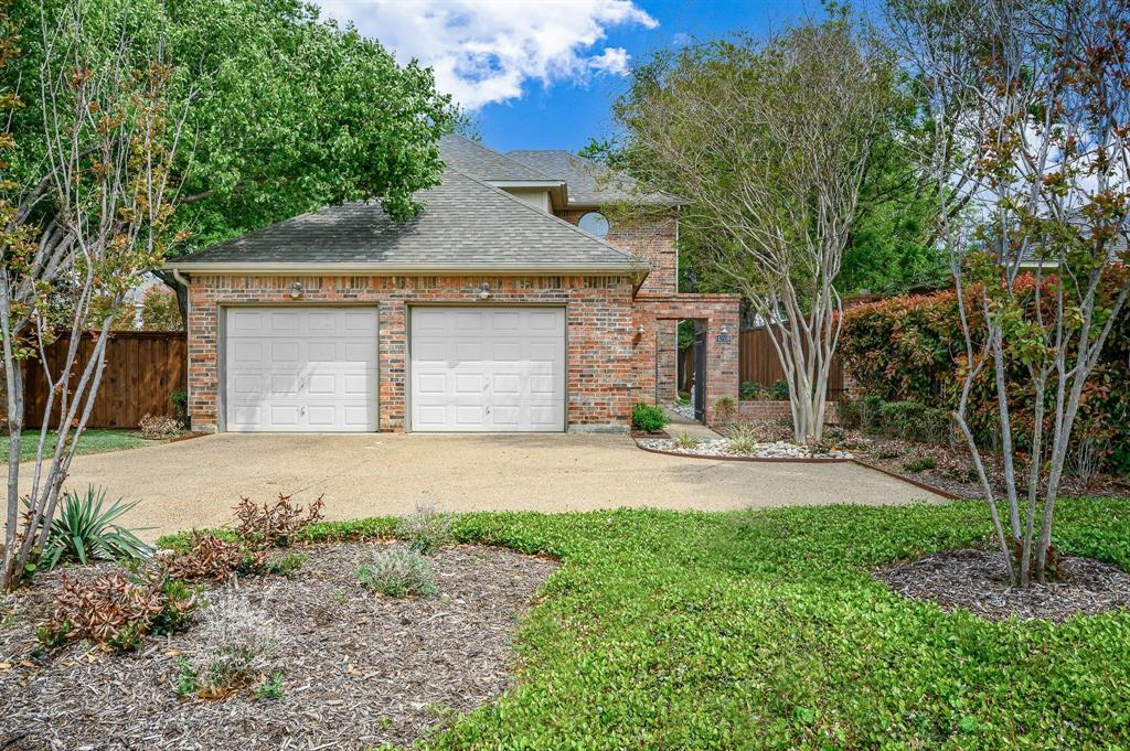 4209 Sexton Lane Dallas, TX 75229 - Photo 4 of 27 a front view of house with yard and trees