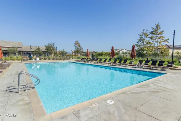 a view of a swimming pool and outdoor space