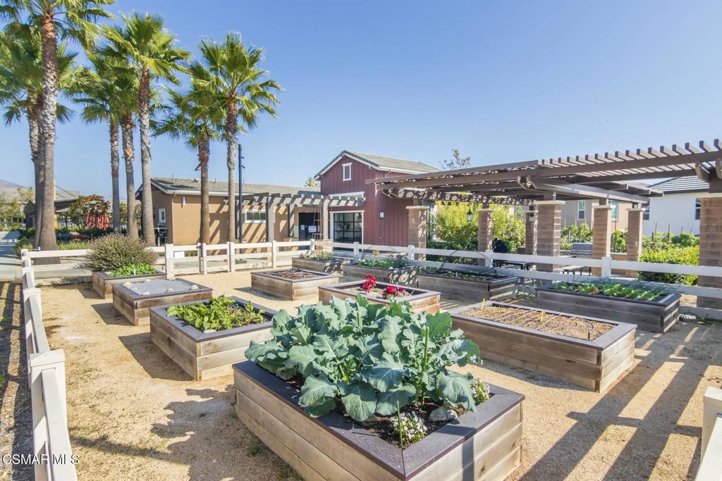 1855 Malalenca Road Santa Paula, CA 93060 - Photo 33 of 39 a front view of a house with garden and sitting area