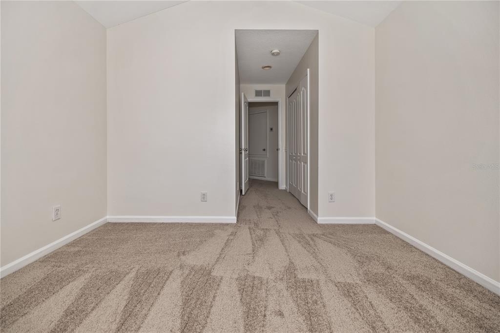 8520 Sandy Beach Street Tampa, FL 33634 - Photo 13 of 25 a view of an empty room