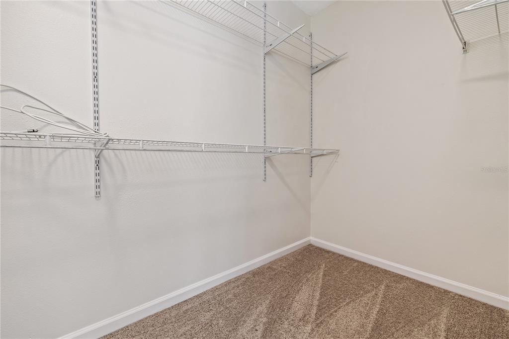 8520 Sandy Beach Street Tampa, FL 33634 - Photo 20 of 25 a view of small space with racks on the wall