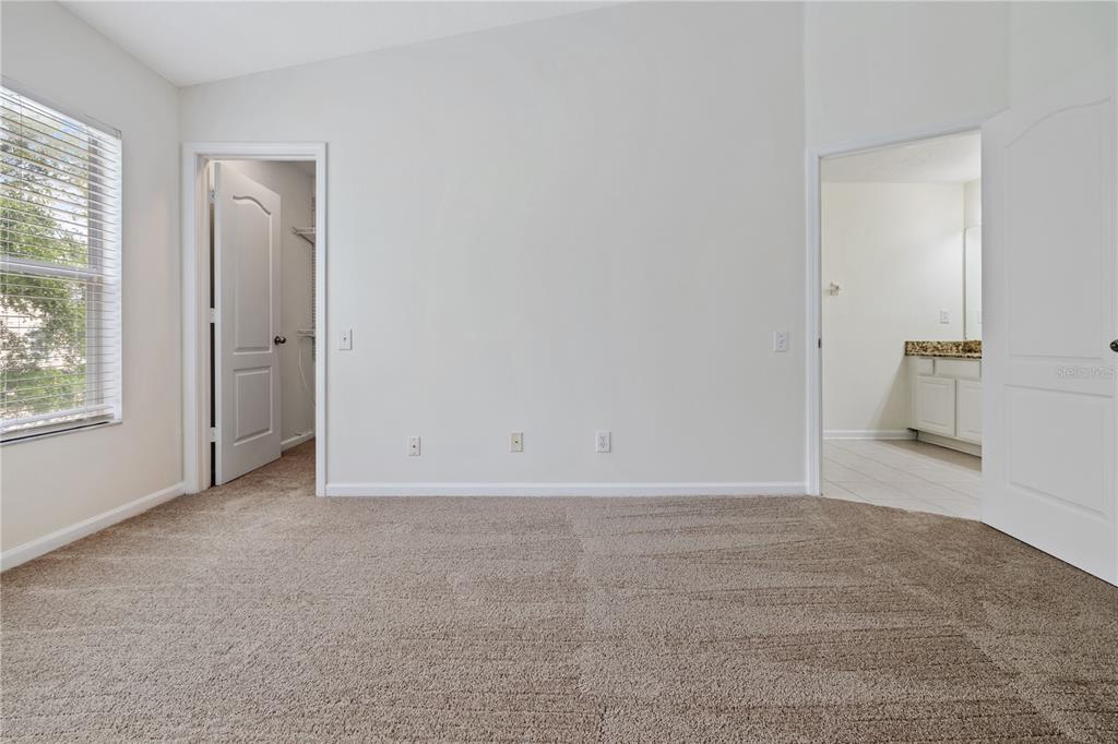 8520 Sandy Beach Street Tampa, FL 33634 - Photo 21 of 25 a view of an empty room and window