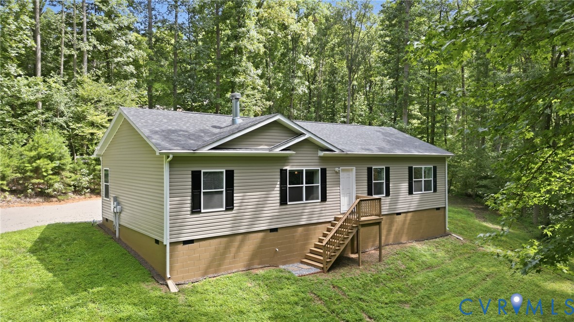2575 Log Cabin Road Maidens, VA 23102 - Photo 1 of 36 Charming single-story home elevated on a concrete