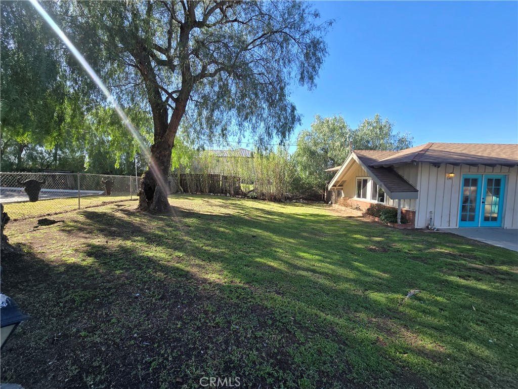 607 Sixth Street Norco, CA 92860 - Photo 28 of 33 a view of a house with a yard