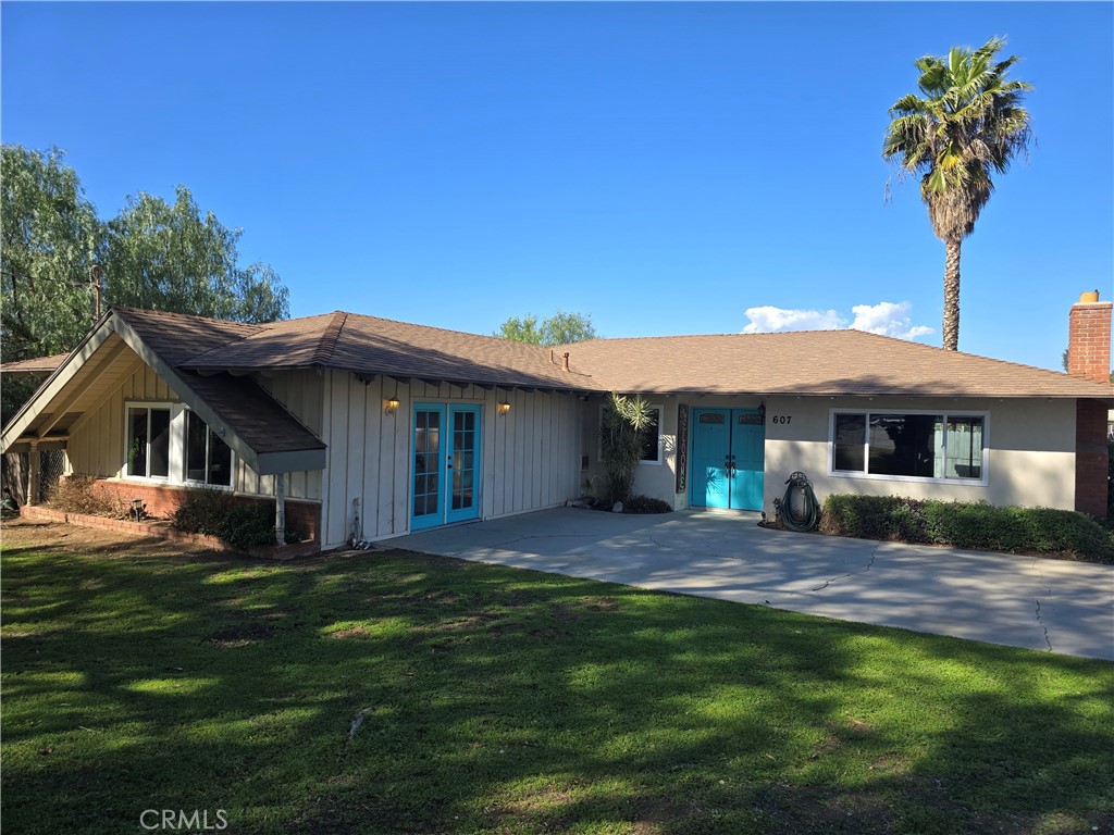 607 Sixth Street Norco, CA 92860 - Photo 29 of 33 a front view of a house with a yard