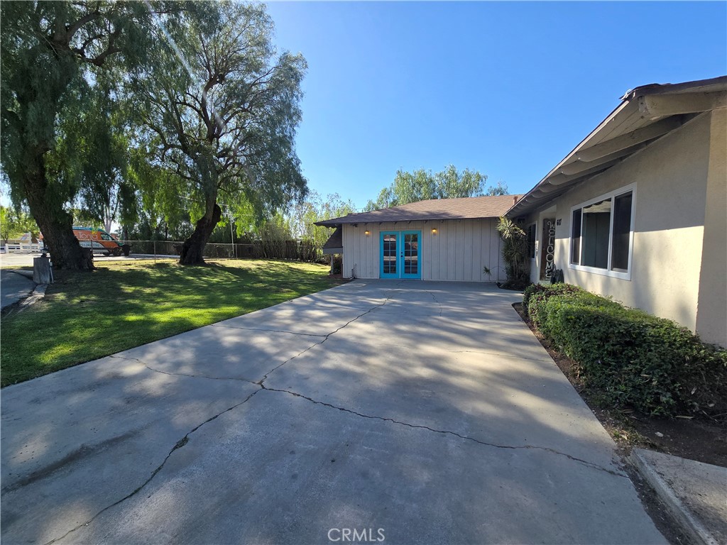 607 Sixth Street Norco, CA 92860 - Photo 30 of 33 a view of a house with a yard