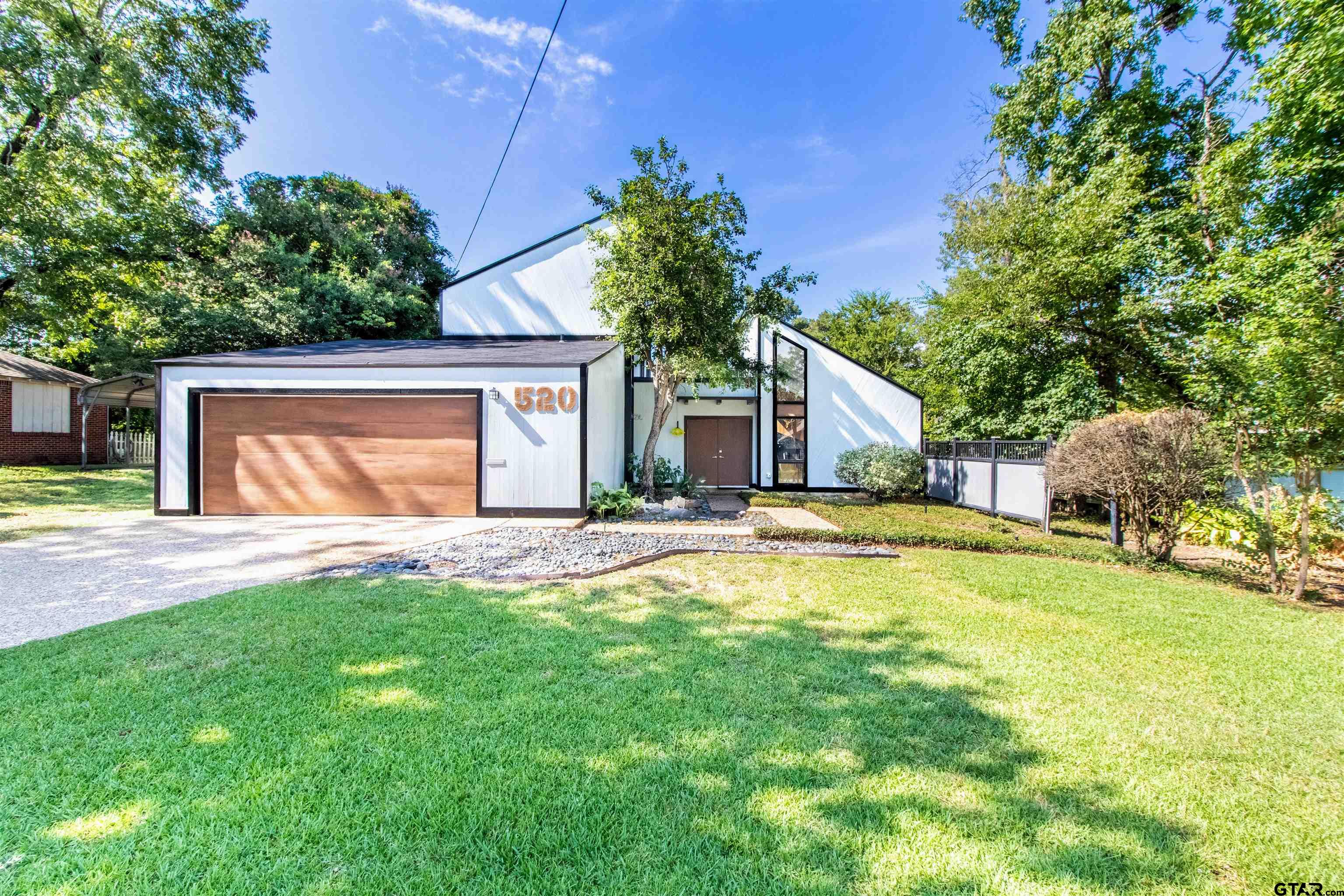 a house view with a outdoor space
