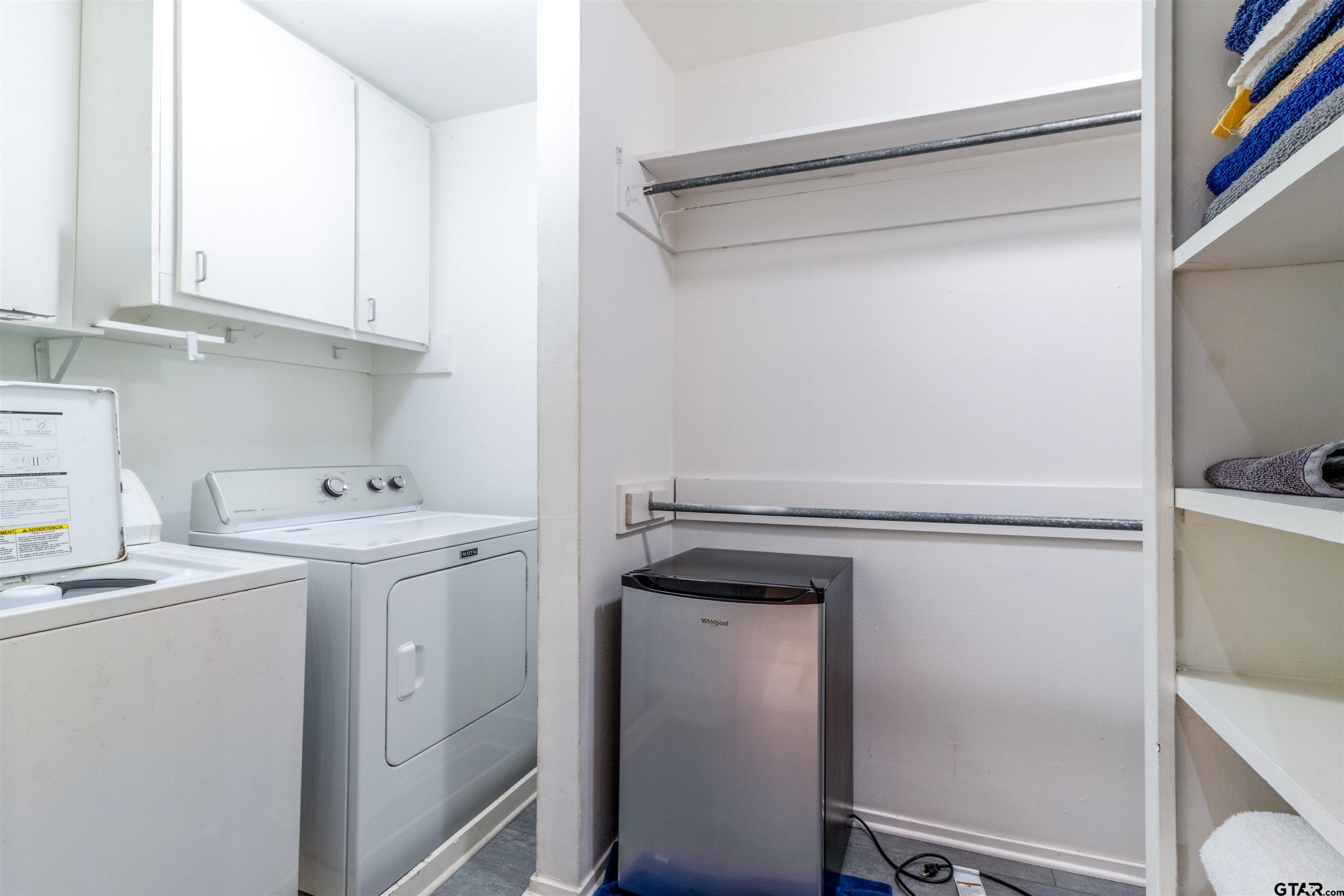 520 East Lake Street Tyler, TX 75701 - Photo 27 of 41 a utility room with dryer and washer
