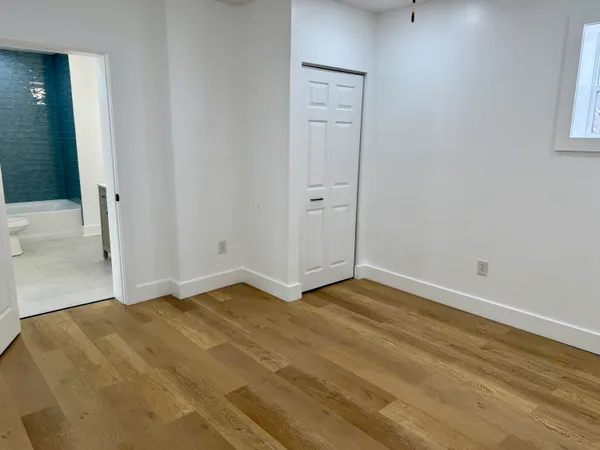 a view of an empty room and window