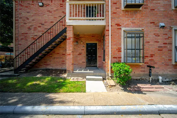 a front view of a house with garage