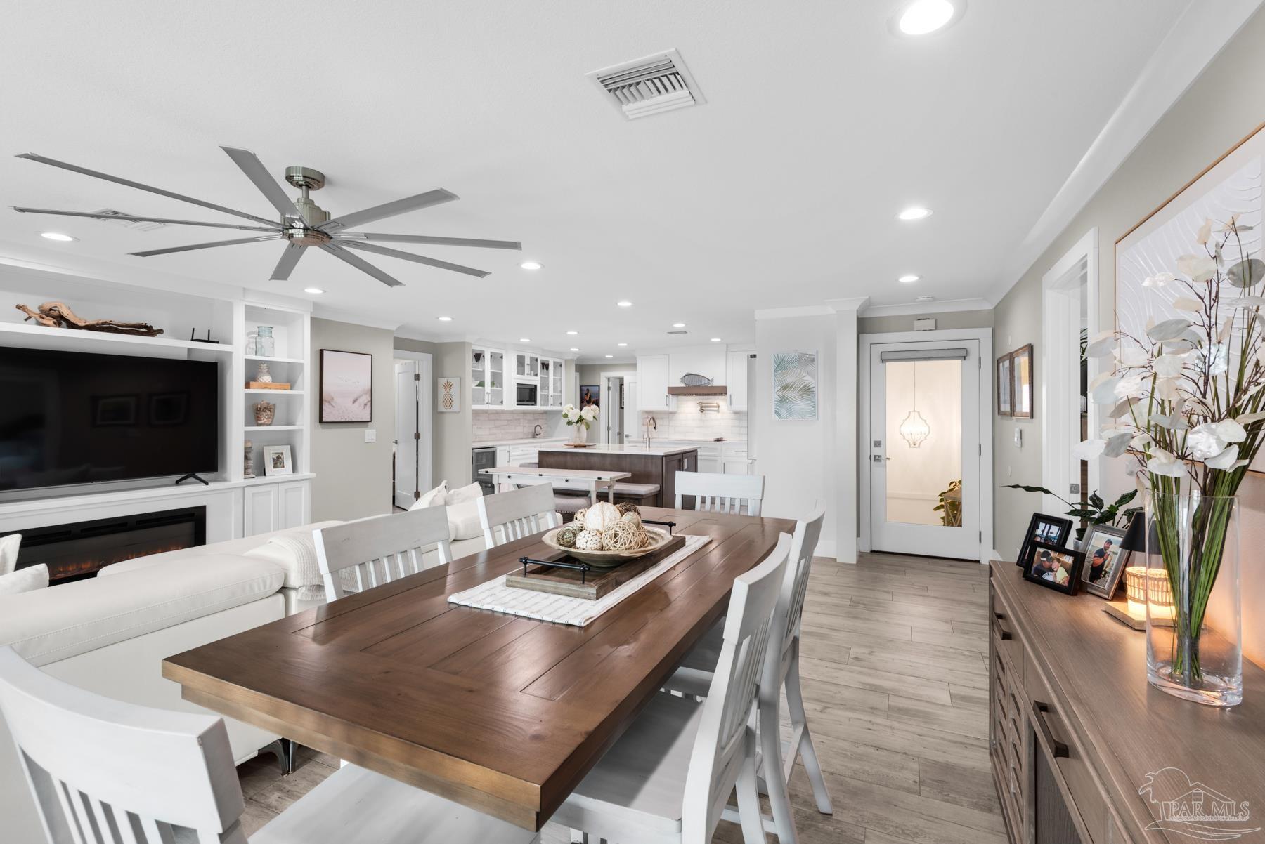 2829 Bay Street Gulf Breeze, FL 32563 - Photo 18 of 69 a living room with furniture and a flat screen tv